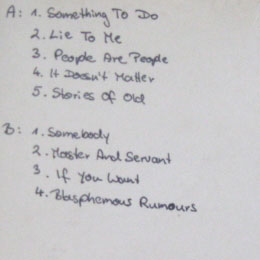 Detail Rückseite Cover: handgeschriebene Tracklist