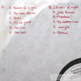 Detail Rückseite Cover: handgeschriebene Tracklist